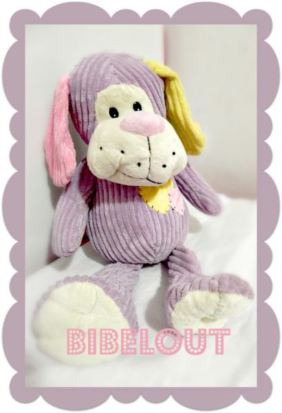 Cachorro pelucia roxo
